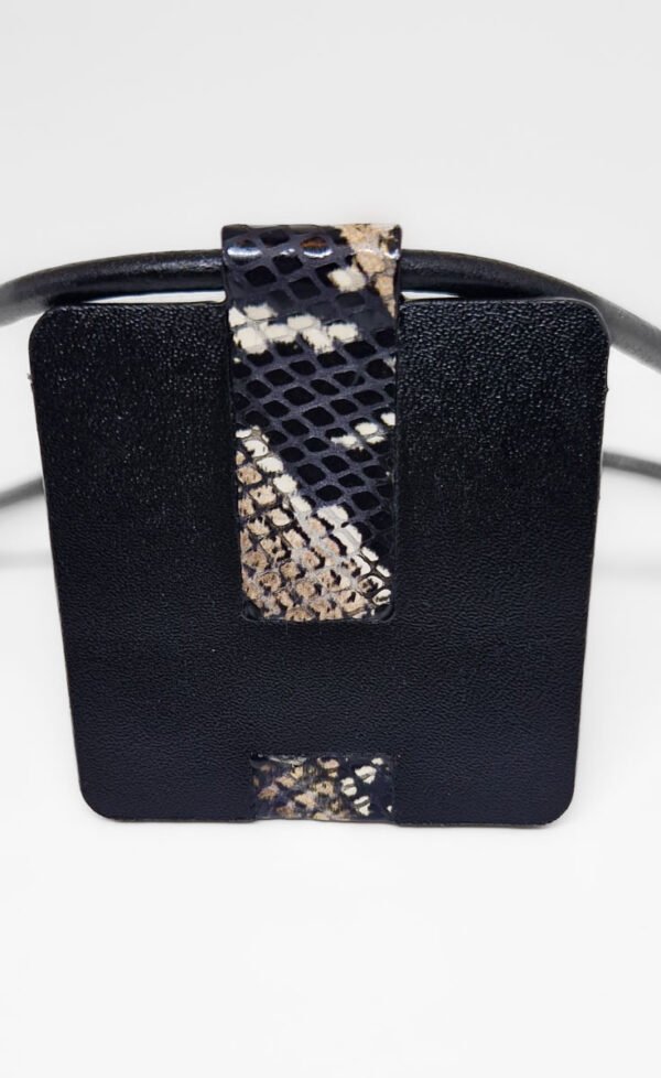 H. Cuir noir,motif serpent